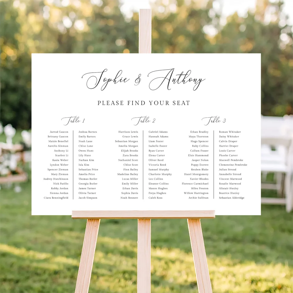 Elegant long-table wedding seating chart for three long tables, displayed outdoors in a garden setting. The Marais design features a horizontal layout with delicate script typography for a garden-party aesthetic.