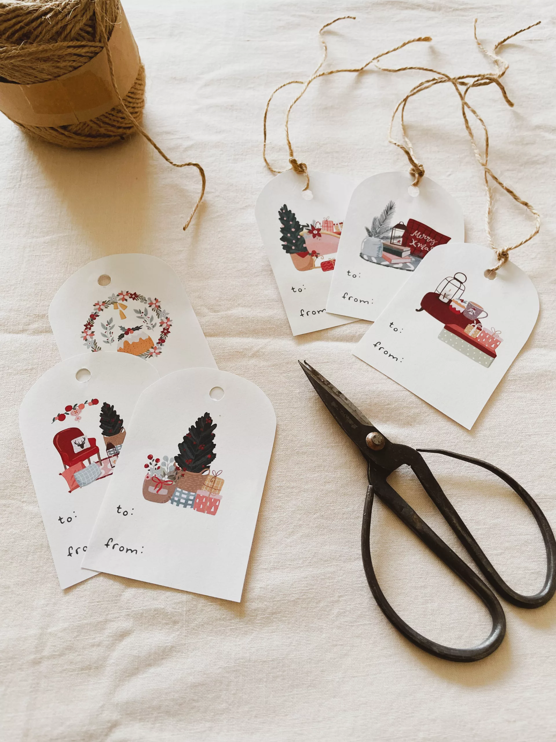 Cute and Cosy free printable Christmas gift tags styled with twine and scissors