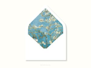 White envelope with a printed liner showing almond blossoms on a blue background.