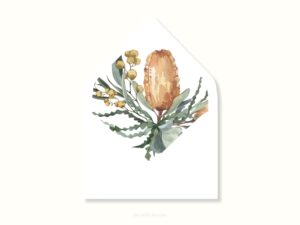 White envelope with a printed liner showing a painted banksia bouquet.