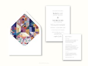 White envelope with a printed liner showing an abstract painting next to wedding invitations.