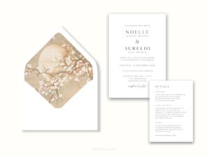 White envelope with a printed liner showing painted Japanese cherry blossoms next to wedding invitations.