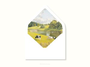 White envelope with a printed liner showing a farm pasture landscape.