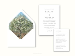 White envelope with a printed liner showing a painted orchard tree in bloom.