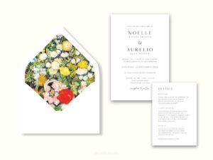 White envelope with a printed liner showing a painting of white and yellow flowers next to wedding invitations.