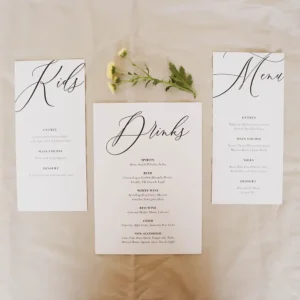 Three menu cards next to each other on a table