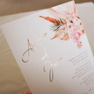 A close up of a wedding invitation