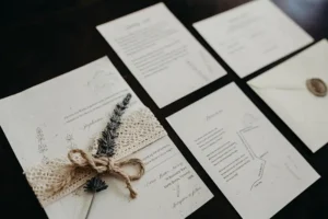 A wedding invitation set on a table