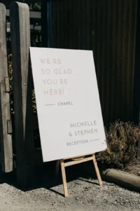 A wedding welcome sign on an easel