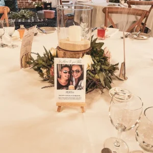 A wedding table number with a photo on it