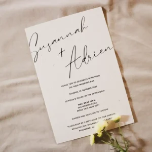 A wedding invitation on a table