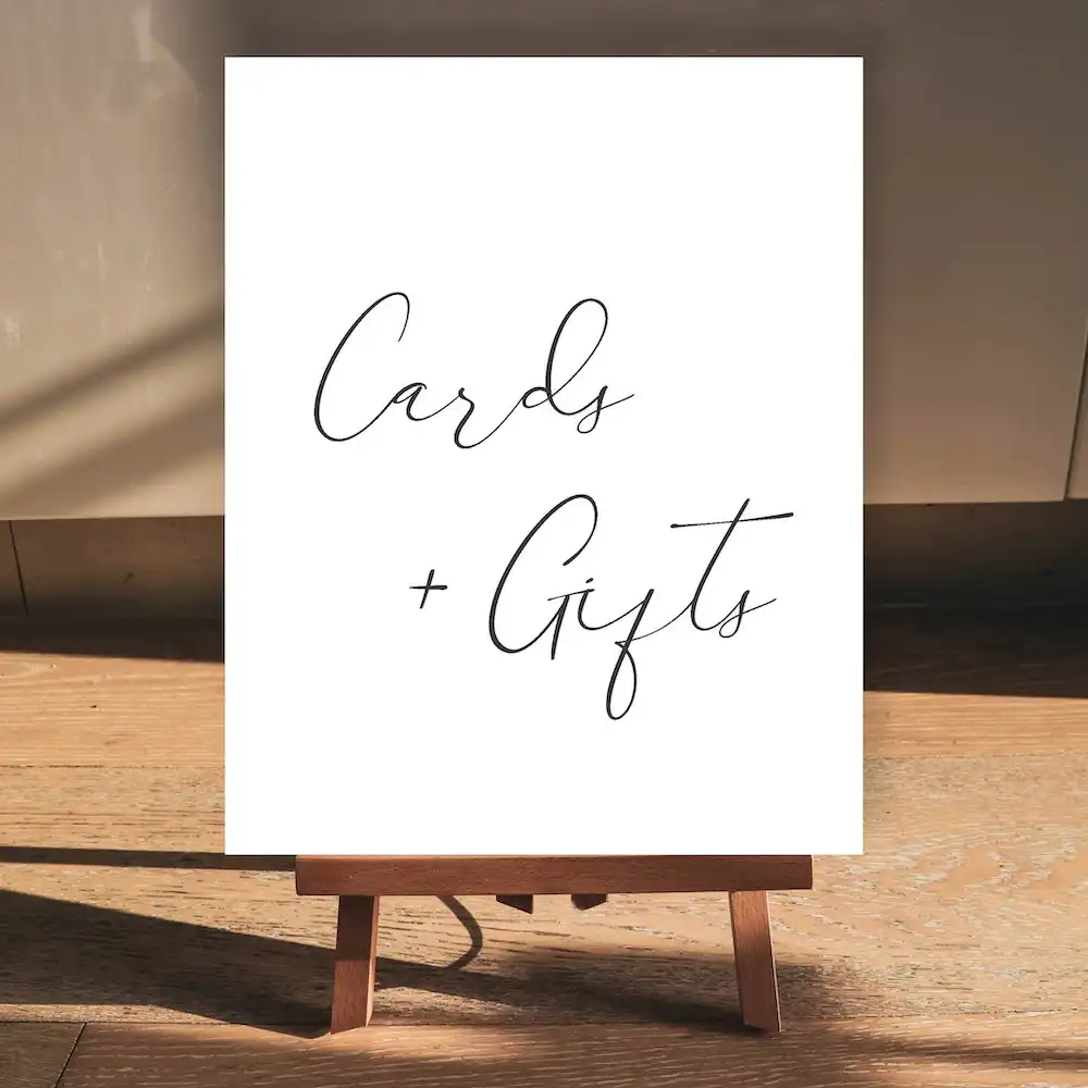 Our free printable cards and gifts sign displayed on an easel