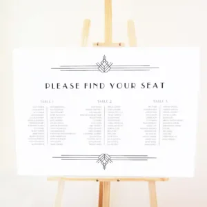 A wedding seating chart sign on an easel