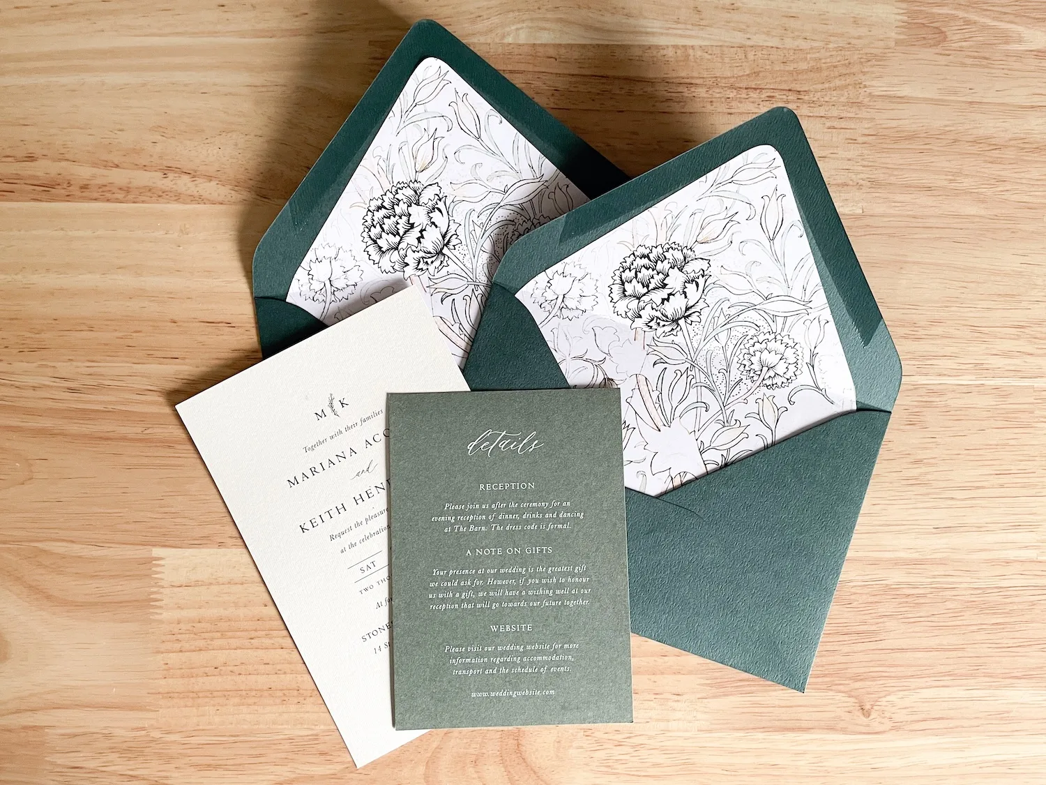 Wild Tulip envelope liners in green envelopes styled with wedding invitation suite