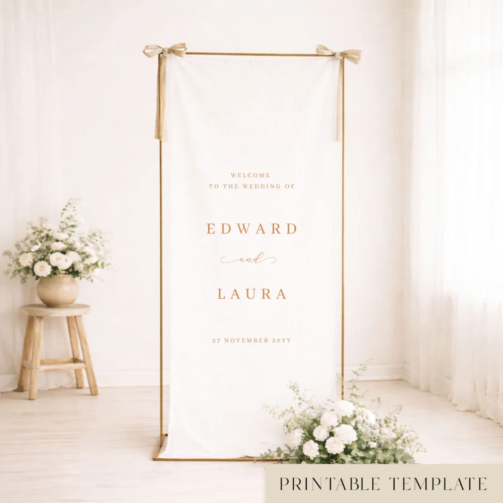 Gold frame with a hanging elegant white linen fabric wedding welcome sign with brown typography.
