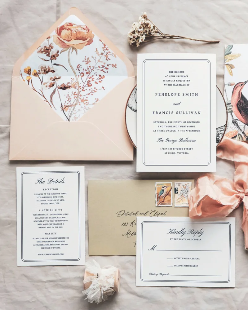 A wedding invitation flatlay with the Parlour design from The Hello Bureau.
