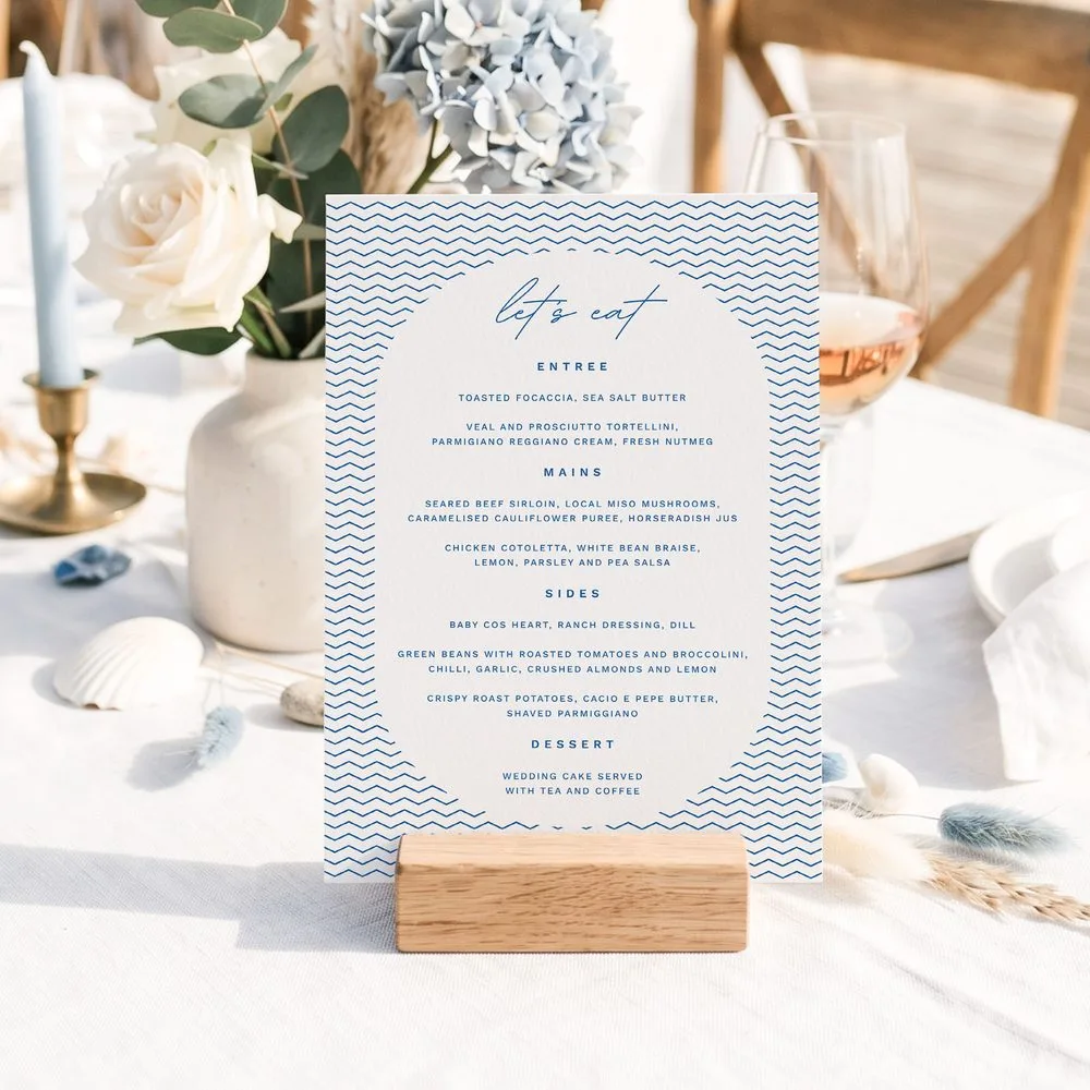 Blue casual coastal menu with modern fonts and chevron pattern