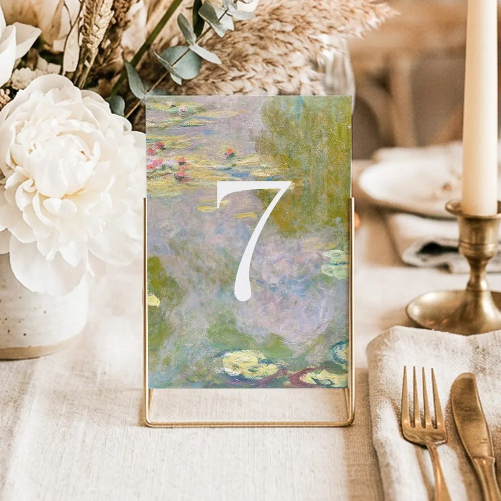 Monet table numbers featuring water lilies painting